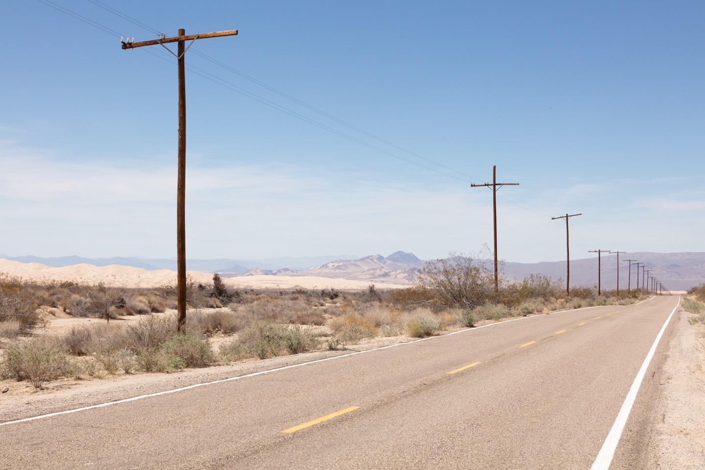 Adobe Stock Photo - Telephone poles in Mojave Desert